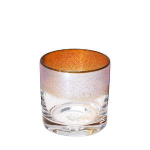 The Aristocrat cocktail glass with transparent amber / orange color stripe and metallic reflection.