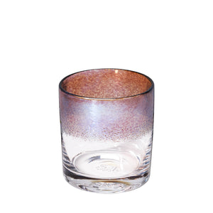 The Royal cocktail glass with metallic purple reflection.